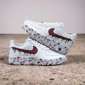 Personalized baseball-themed Air Force 1 sneakers with gold Nike swoosh and red stitching details.