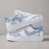 Custom Blue Cherry Blossoms Air Force 1 sneakers with floral design and white base.