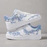 Custom Blue Cherry Blossoms Air Force 1 sneakers with floral design and white base.